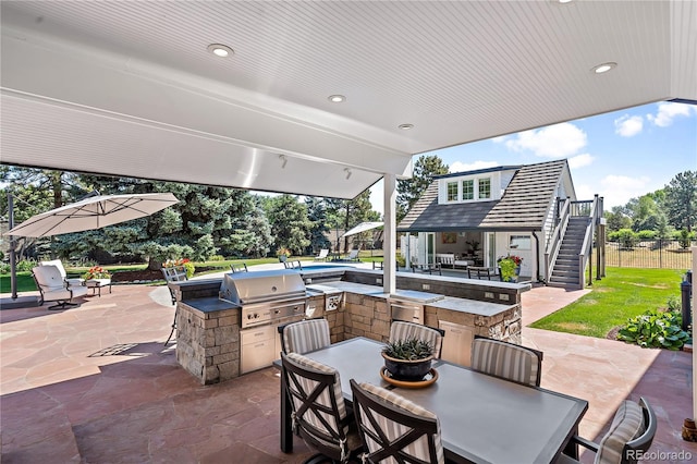 view of patio with a grill and exterior kitchen