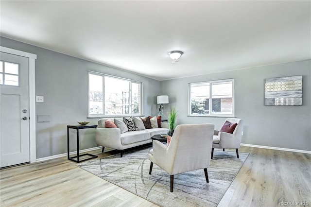 2921 E Colorado Ave, Denver, CO 80210 - living area featuring light wood-style floors and baseboards