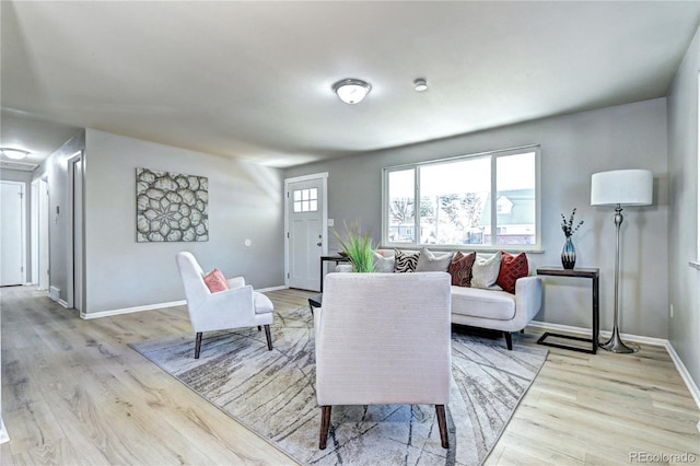 2921 E Colorado Ave, Denver, CO 80210 - living area featuring light wood-type flooring and baseboards