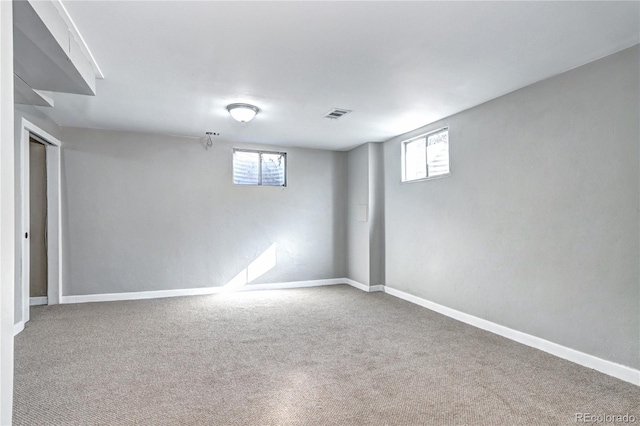 2921 E Colorado Ave, Denver, CO 80210 - basement with plenty of natural light, carpet flooring, and baseboards
