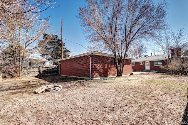 2921 E Colorado Ave, Denver, CO 80210 - view of property exterior with brick siding and fence
