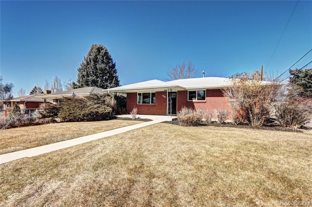 2921 E Colorado Ave, Denver, CO 80210 - ranch-style home with a front yard, brick siding, and fence