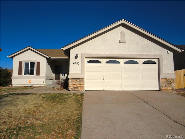 single story home featuring a garage