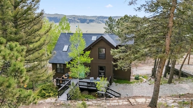 2028 Redhill Rd, Fairplay, CO 80440 - rear view of property with a shingled roof and a mountain view