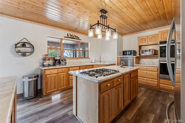 2028 Redhill Rd, Fairplay, CO 80440 - kitchen with appliances with stainless steel finishes, a sink, light countertops, wooden ceiling, and dark wood finished floors