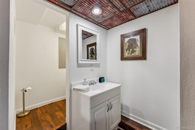 2028 Redhill Rd, Fairplay, CO 80440 - bathroom with vanity, baseboards, wood finished floors, and wooden ceiling