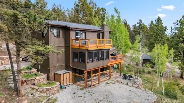 2028 Redhill Rd, Fairplay, CO 80440 - back of house with a balcony and a chimney