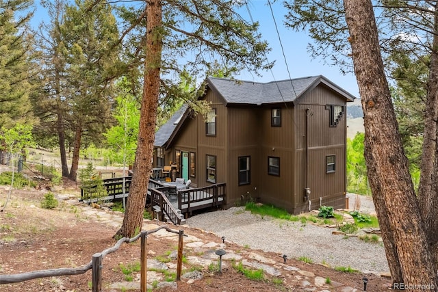 2028 Redhill Rd, Fairplay, CO 80440 - back of property featuring a shingled roof and a wooden deck