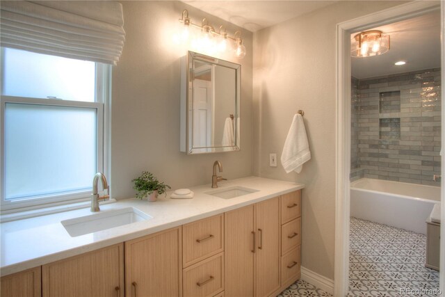 8140 S Storm King Peak, Littleton, CO 80127 - full bathroom featuring double vanity, tile patterned floors, and shower / bath combination