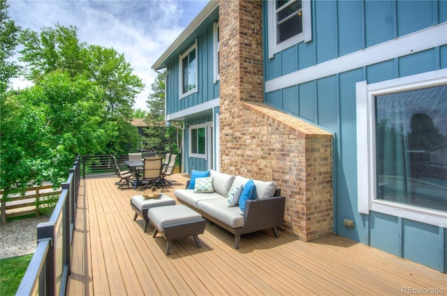 8140 S Storm King Peak, Littleton, CO 80127 - deck featuring outdoor dining space and an outdoor hangout area