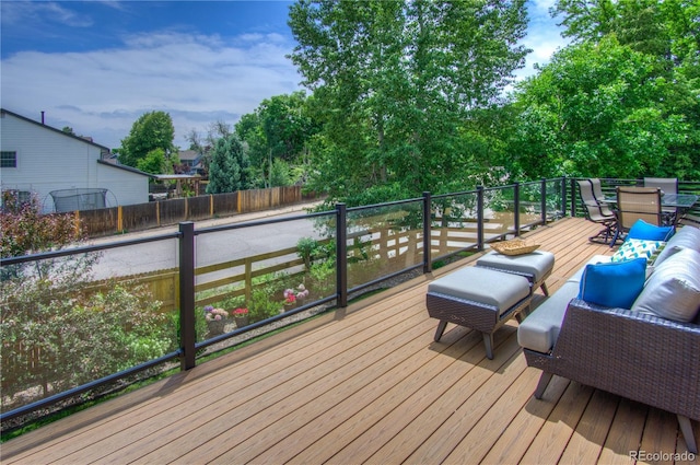 8140 S Storm King Peak, Littleton, CO 80127 - wooden terrace with outdoor dining area