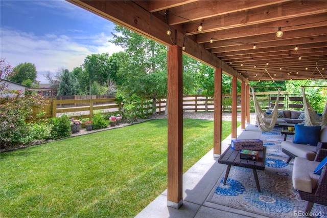 8140 S Storm King Peak, Littleton, CO 80127 - fenced backyard with outdoor lounge area and a patio
