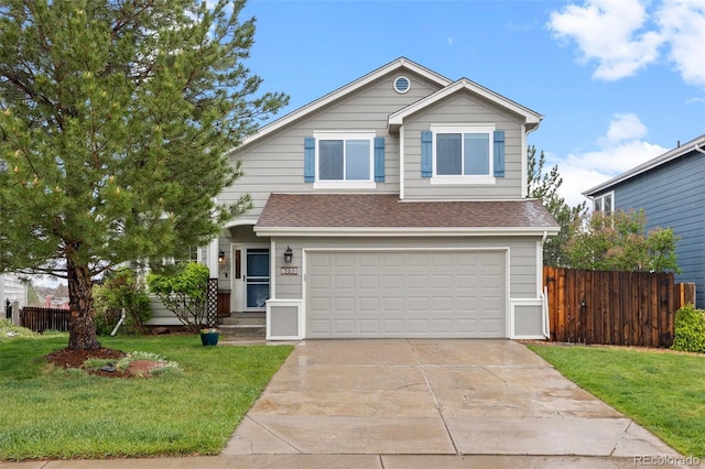 view of front facade with a garage, driveway, and a shingled roof