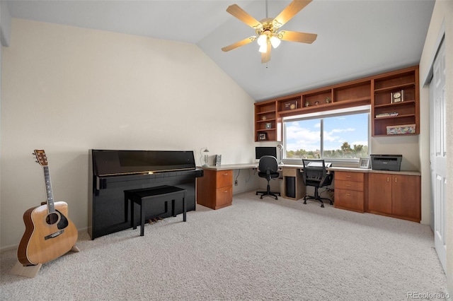 office featuring vaulted ceiling, light colored carpet, and ceiling fan