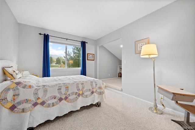 carpeted bedroom with baseboards