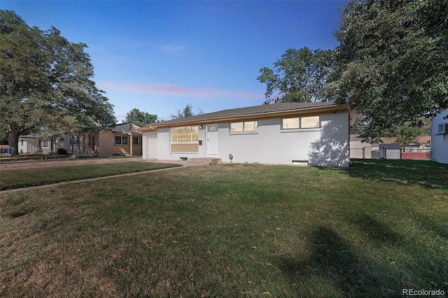 single story home with fence, an attached garage, and a front yard