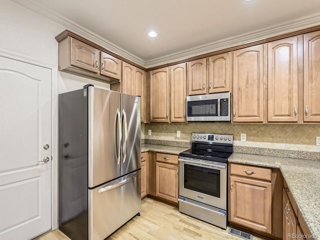 11883 E Fair Ave, Greenwood Village, CO 80111 - kitchen with appliances with stainless steel finishes, light wood-style floors, decorative backsplash, ornamental molding, and recessed lighting