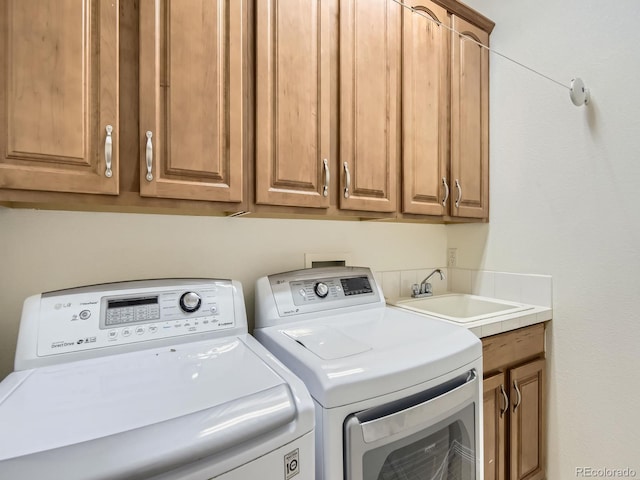 11883 E Fair Ave, Greenwood Village, CO 80111 - laundry room with washing machine and dryer and cabinet space