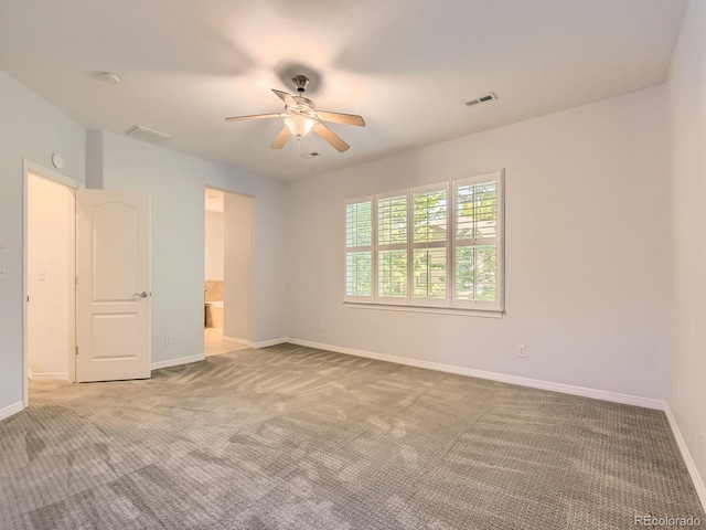 11883 E Fair Ave, Greenwood Village, CO 80111 - spare room with light carpet and a ceiling fan