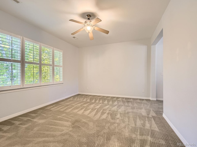 11883 E Fair Ave, Greenwood Village, CO 80111 - carpeted spare room with a ceiling fan and baseboards