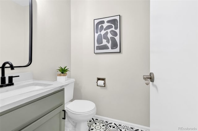 275 S Pembrook St, Castle Rock, CO 80104 - bathroom featuring toilet, vanity, and baseboards