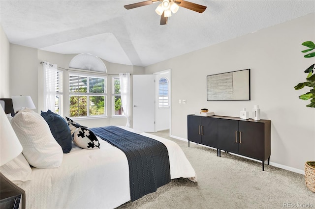 275 S Pembrook St, Castle Rock, CO 80104 - bedroom featuring carpet floors, baseboards, vaulted ceiling, ceiling fan, and a textured ceiling