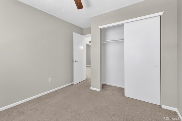 275 S Pembrook St, Castle Rock, CO 80104 - unfurnished bedroom with carpet, a closet, baseboards, and ceiling fan