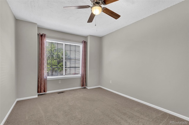 275 S Pembrook St, Castle Rock, CO 80104 - carpeted spare room featuring baseboards, a textured ceiling, and a ceiling fan