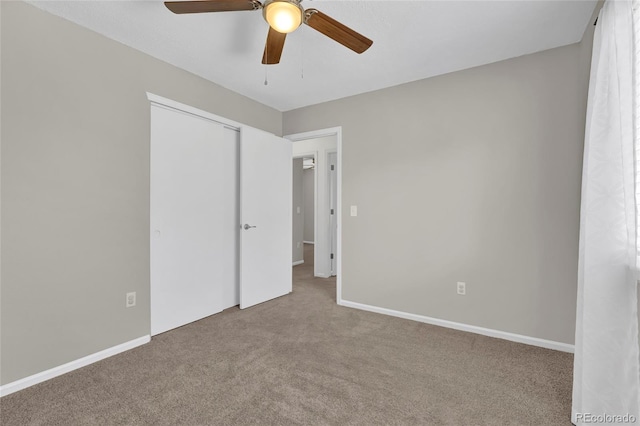 275 S Pembrook St, Castle Rock, CO 80104 - unfurnished bedroom featuring carpet, a closet, baseboards, and a ceiling fan