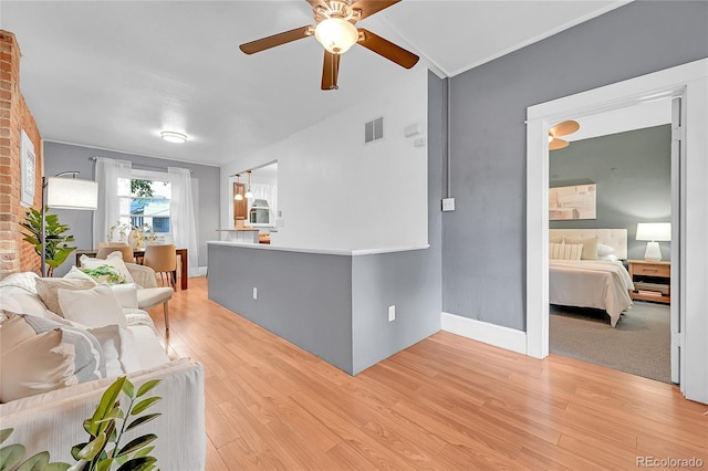 1005 S Pennsylvania St, Denver, CO 80209 - living area featuring a ceiling fan and light wood-type flooring