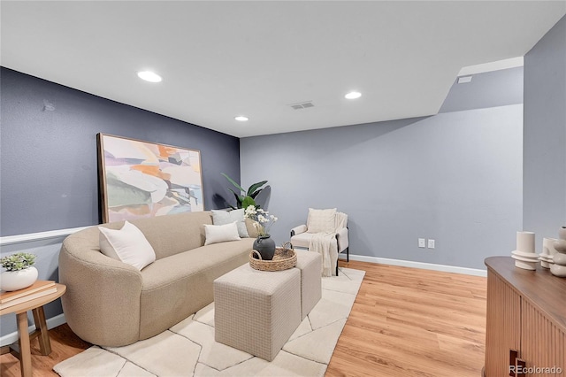 1005 S Pennsylvania St, Denver, CO 80209 - living room featuring light wood finished floors and recessed lighting