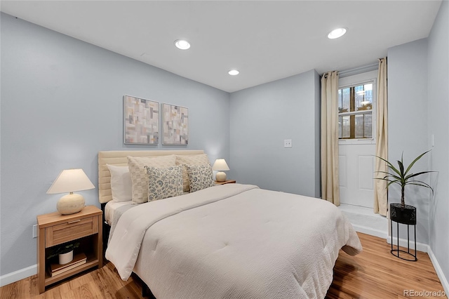 1005 S Pennsylvania St, Denver, CO 80209 - bedroom with light wood-style floors and recessed lighting