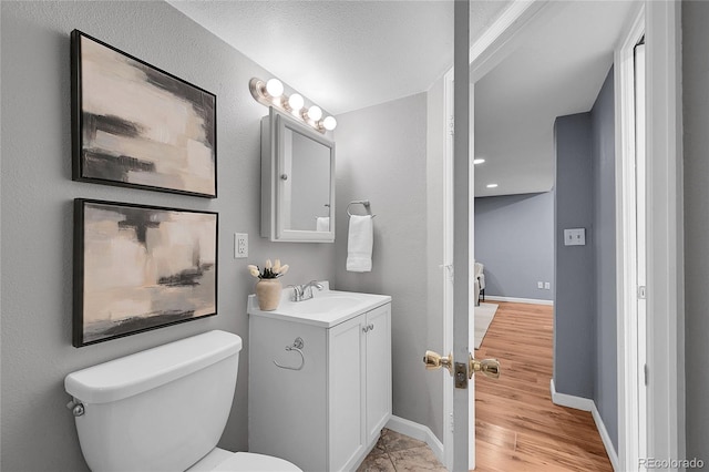 1005 S Pennsylvania St, Denver, CO 80209 - bathroom featuring vanity and wood finished floors