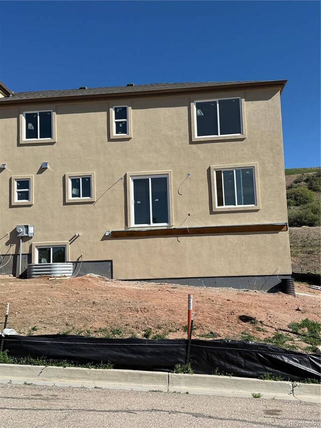 701 Little Bear, Colorado Springs, CO 80907 - view of side of property with stucco siding