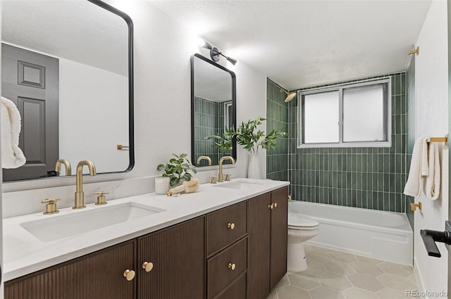 4269 Carter Trl, Boulder, CO 80301 - full bathroom featuring toilet, double vanity, tile patterned flooring, tub / shower combination, and a textured ceiling
