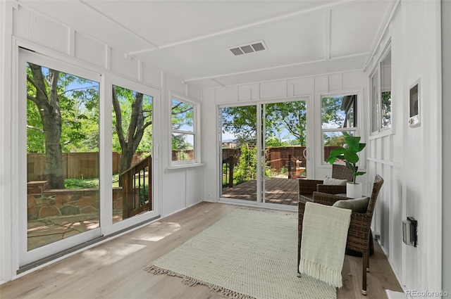 4269 Carter Trl, Boulder, CO 80301 - sunroom featuring wood finished floors and a decorative wall