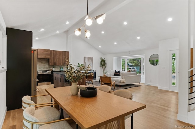 4269 Carter Trl, Boulder, CO 80301 - dining area with high vaulted ceiling, light wood finished floors, beamed ceiling, recessed lighting, and baseboards