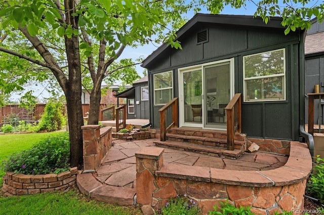 4269 Carter Trl, Boulder, CO 80301 - back of property with entry steps and a patio area
