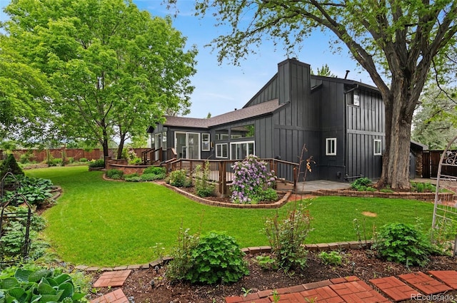 4269 Carter Trl, Boulder, CO 80301 - rear view of house featuring board and batten siding, a deck, and a shingled roof