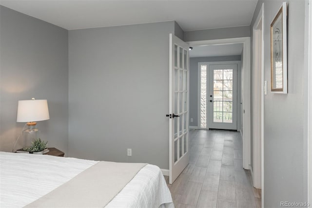 bedroom featuring baseboards