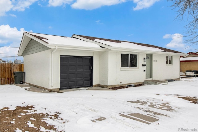 ranch-style house with a garage