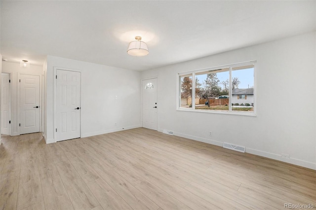 empty room featuring light wood-type flooring