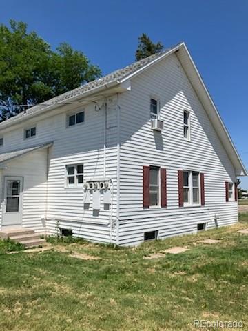 440 Colorado Ave, Stratton, CO 80836 - view of home's exterior featuring a yard