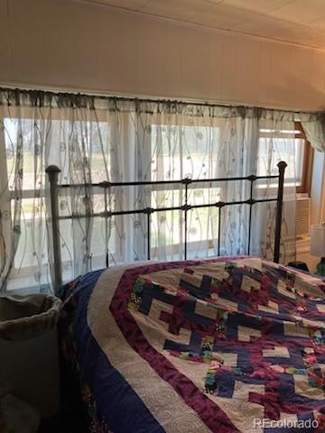 440 Colorado Ave, Stratton, CO 80836 - bedroom featuring multiple windows
