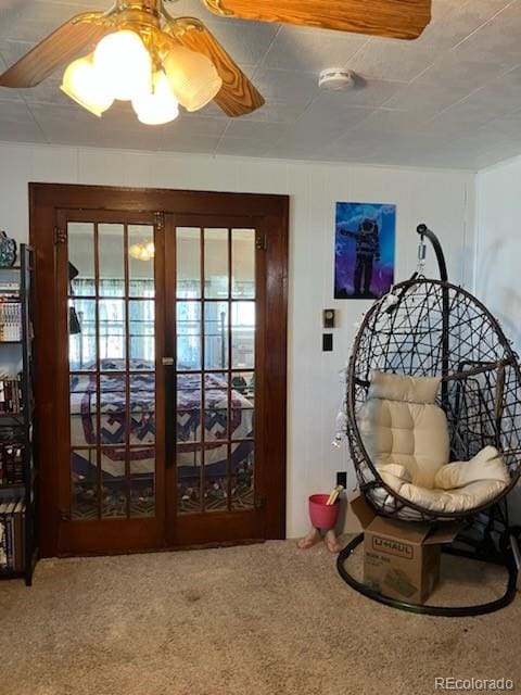 440 Colorado Ave, Stratton, CO 80836 - doorway with carpet floors and ceiling fan