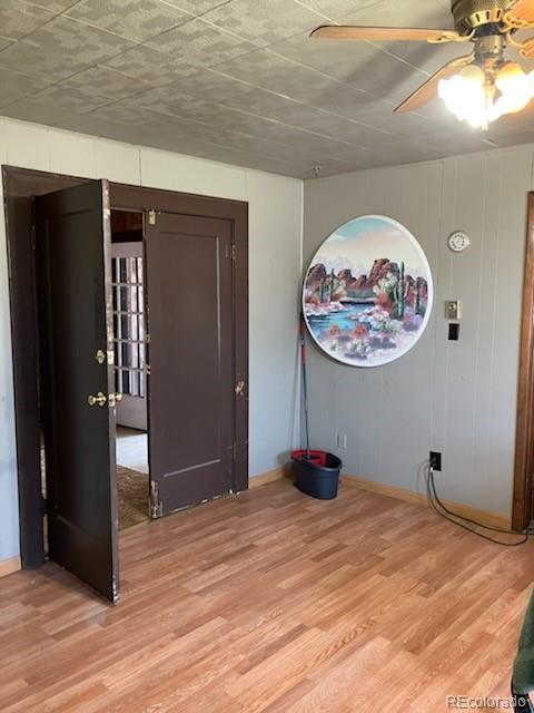 440 Colorado Ave, Stratton, CO 80836 - spare room with light wood finished floors and a ceiling fan