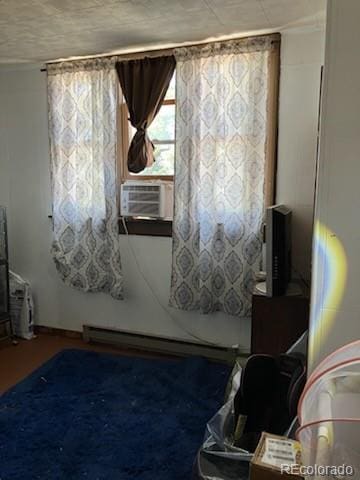440 Colorado Ave, Stratton, CO 80836 - bedroom featuring cooling unit and a baseboard heating unit