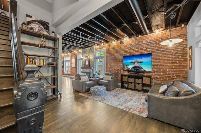 3410 Pecos St, Denver, CO 80211 - living room with brick wall and wood finished floors