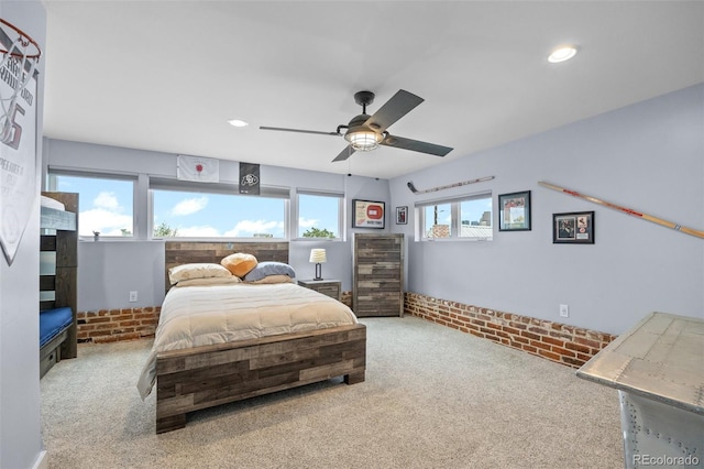 3410 Pecos St, Denver, CO 80211 - carpeted bedroom with ceiling fan, recessed lighting, and brick wall