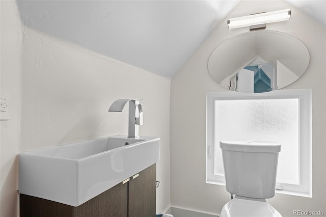 3410 Pecos St, Denver, CO 80211 - bathroom featuring lofted ceiling and vanity